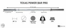 Load image into Gallery viewer, A product information graphic for the Texas Power Bar Pro, showing a silver metal bar with labeled dimensions and feature callouts including 86 1/2" bar length, 29mm shaft diameter, 5" center knurl, single knurl mark, 86 1/2" load sleeve, 29mm diameter, aggressive knurling, 44 lbs weight, 200k tensile strength, and a made in USA mark.

